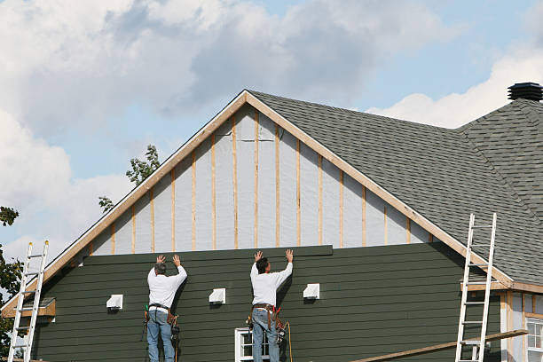 Professional Emergency Siding Repair technician working in Arlington Heights, PA